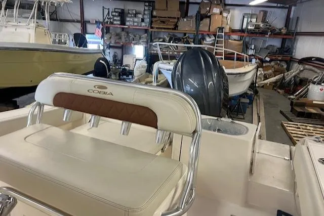 Slide: The Image of Cobia 237 Center Console 2022 in a storage warehouse. - 12
