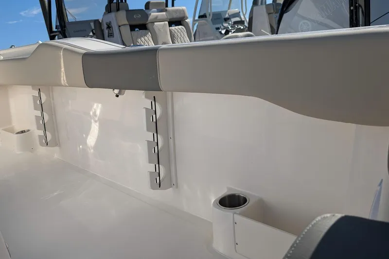 Slide: The Image of 2026 Key West 263 FS boat interior with rod holders and cup holder. - 13