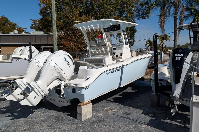 Slide: The Image of 2026 Key West 263 FS boat with dual Yamaha outboard engines on display. - 2