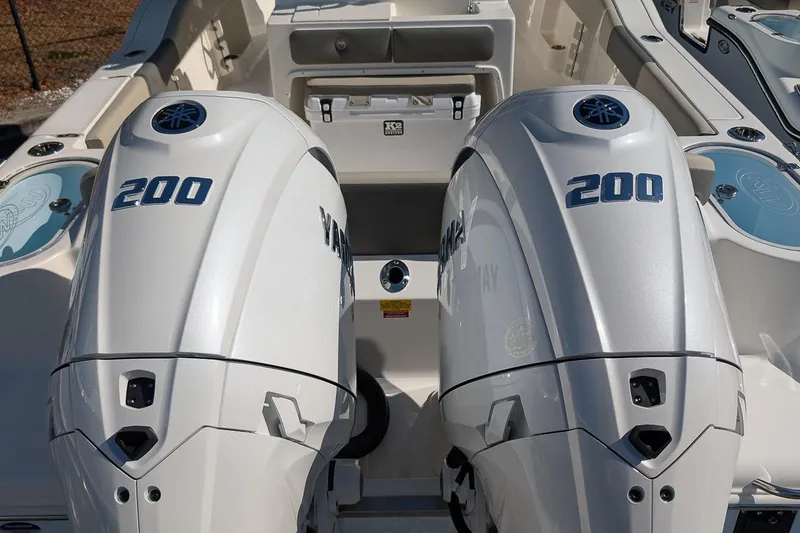 Slide: The Image of Twin Yamaha 200 engines on a 2026 Key West 263 FS boat. - 6