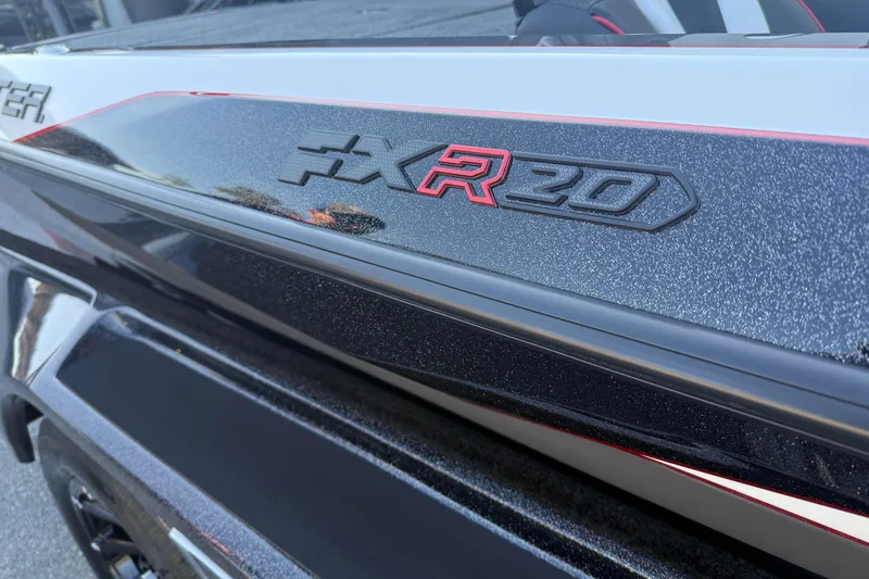 Slide: The Image of 2026 Skeeter FXR20 boat with sleek black and red detailing. - 12