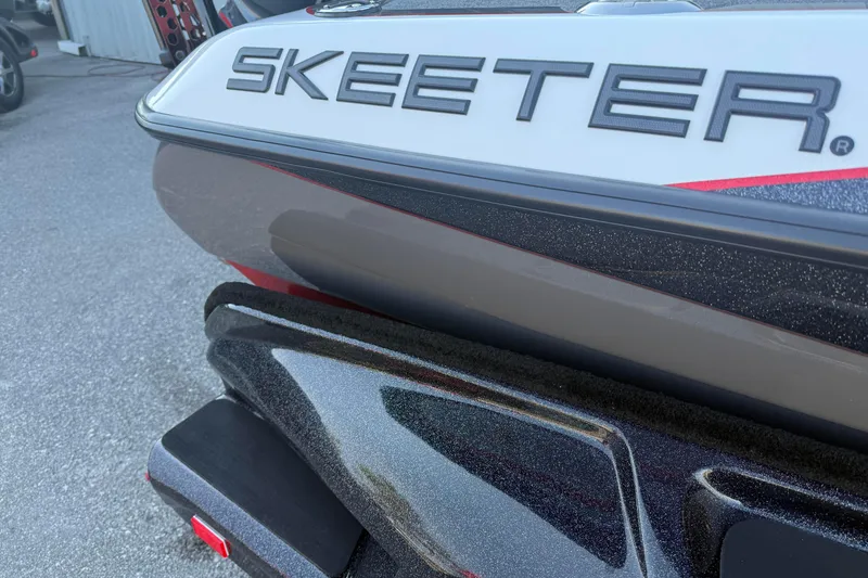 Slide: The Image of 2026 Skeeter FXR20 boat rear view with sleek design and branding. - 13