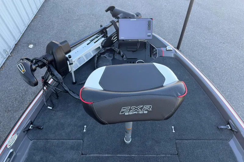 Slide: The Image of 2026 Skeeter FXR20 boat interior with advanced navigation system and comfortable seating. - 4