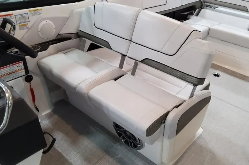 Slide: The Image of 2026 Formula 310 Bowrider I/O interior with white leather seating and modern design. - 12