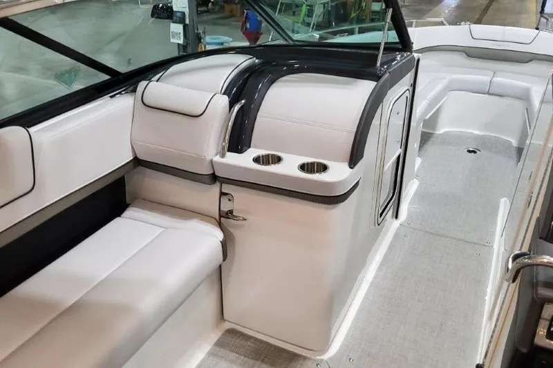 Slide: The Image of 2026 Formula 310 Bowrider I/O interior with seating and cup holders. - 14