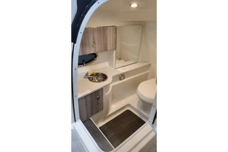 Slide: The Image of 2026 Formula 310 Bowrider I/O boat interior with modern bathroom amenities. - 16