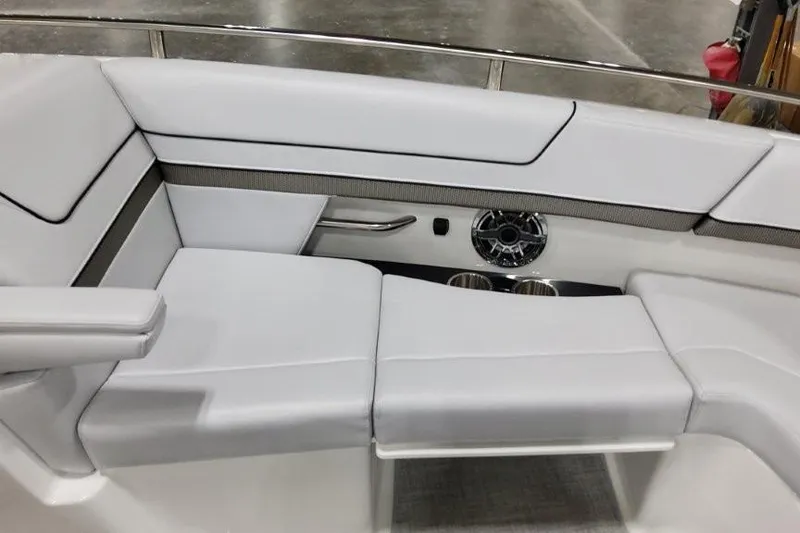 Slide: The Image of 2026 Formula 310 Bowrider I/O interior with sleek white seating and modern design. - 18