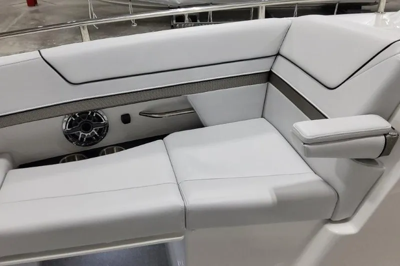 Slide: The Image of Luxurious seating on 2026 Formula 310 Bowrider I/O boat, featuring sleek white upholstery. - 19