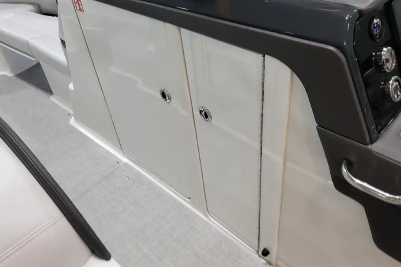 Slide: The Image of 2026 Formula 310 Bowrider I/O interior with sleek storage compartments and modern design. - 23