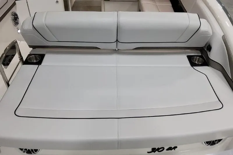 Slide: The Image of 2026 Formula 310 Bowrider I/O boat interior with sleek seating and cup holders. - 35