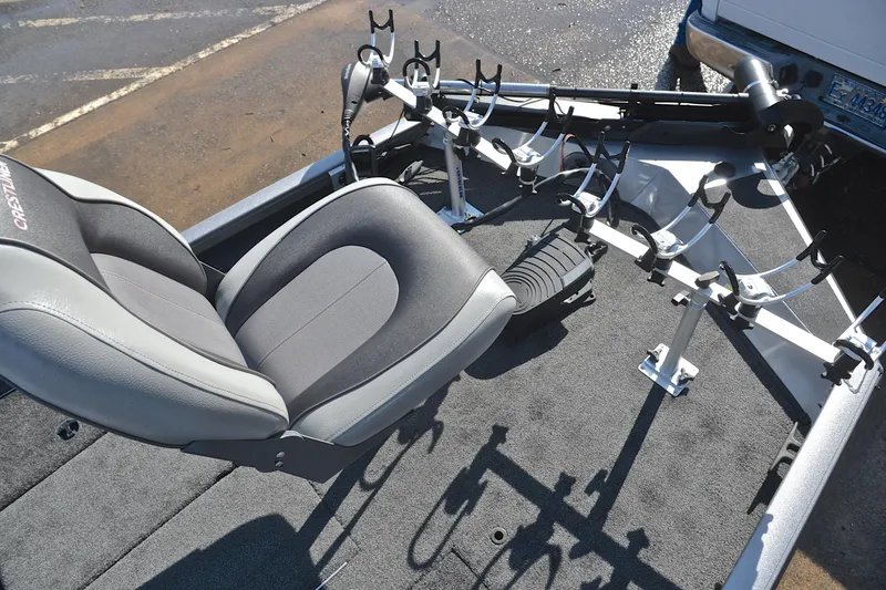 Slide: The Image of 2017 Crestliner VT 17 boat interior with fishing rod holders and seating. - 25