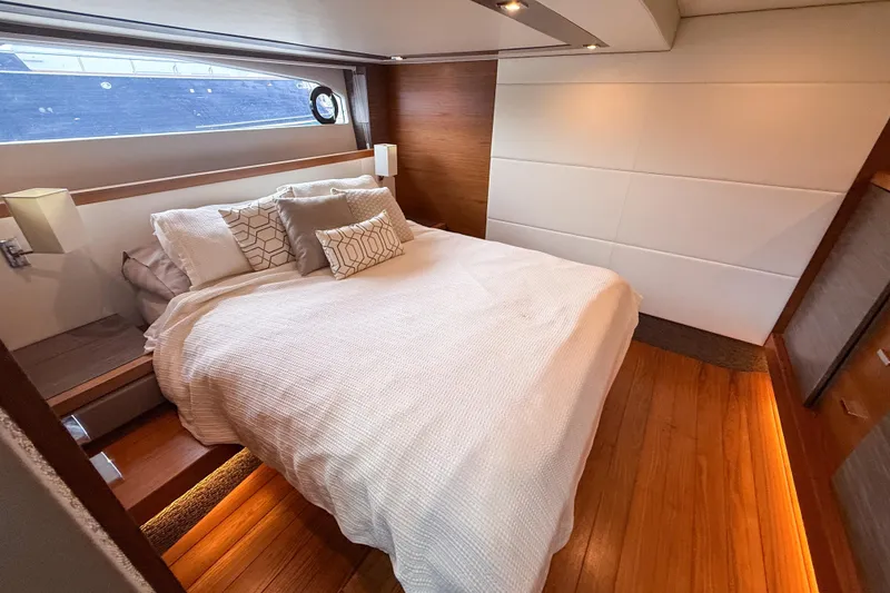 Slide: The Image of Luxurious bedroom interior of 2019 Tiara Yachts F53 Flybridge with modern design and cozy bedding. - 102