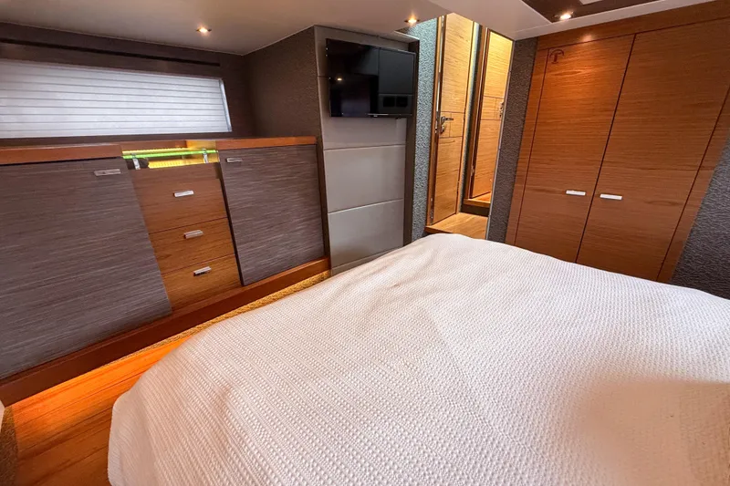 Slide: The Image of Luxurious interior of 2019 Tiara Yachts F53 Flybridge with modern wood cabinetry. - 106