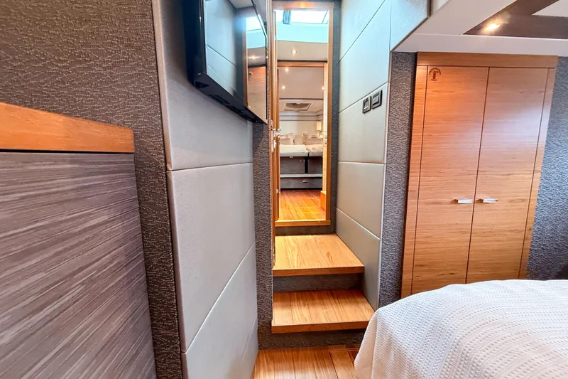 Slide: The Image of Luxurious interior of 2019 Tiara Yachts F53 Flybridge with wooden accents and modern design. - 108
