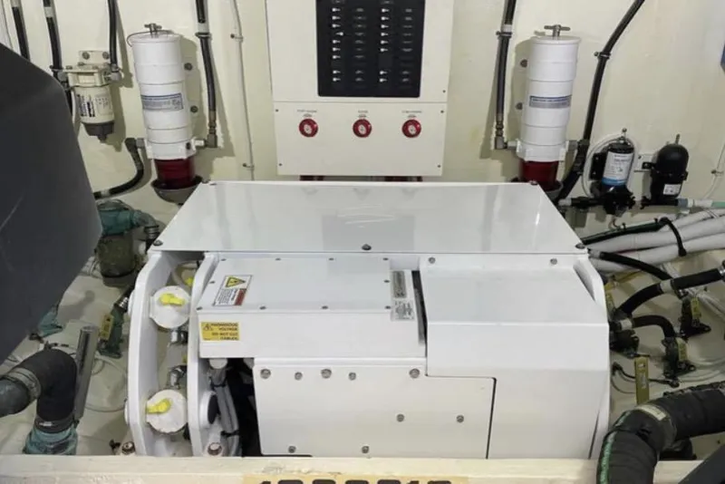 Slide: The Image of 2019 Tiara Yachts F53 Flybridge on open water, rear view. - 26