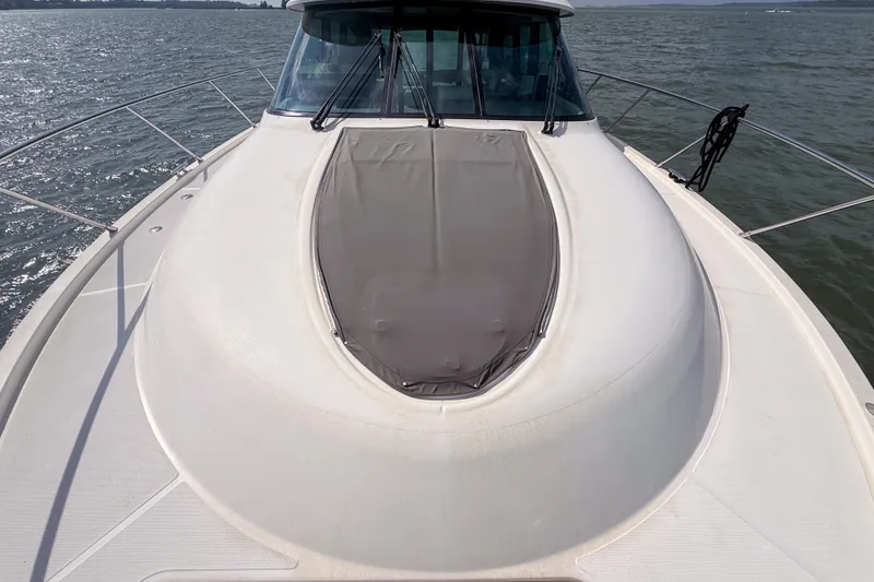 Slide: The Image of 2019 Tiara Yachts F53 Flybridge bow view on open water. - 38