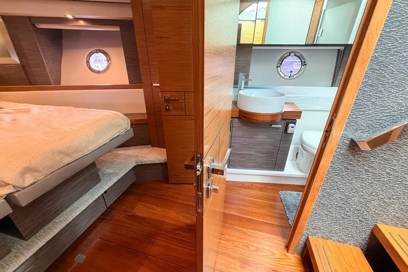 Slide: The Image of Luxurious interior of 2019 Tiara Yachts F53 Flybridge with bedroom and bathroom. - 96