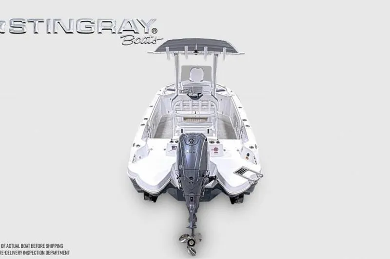 Slide: The Image of 2026 Stingray 211 DC boat, rear view with outboard motor and T-top. - 5
