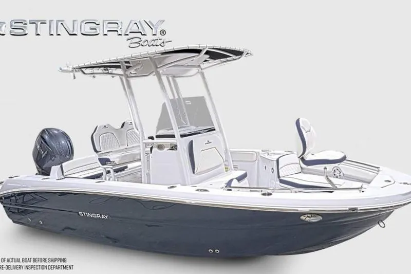 Slide: The Image of 2026 Stingray 211 DC boat with sleek design and modern features. - 3