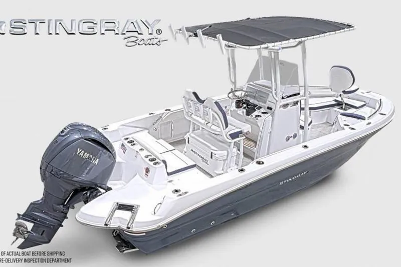 Slide: The Image of 2026 Stingray 211 DC boat with Yamaha outboard motor, featuring sleek design and spacious seating. - 6