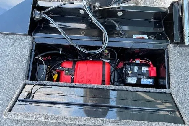 Slide: The Image of 2014 G3 Eagle 166 SE boat battery compartment with wiring and components. - 29