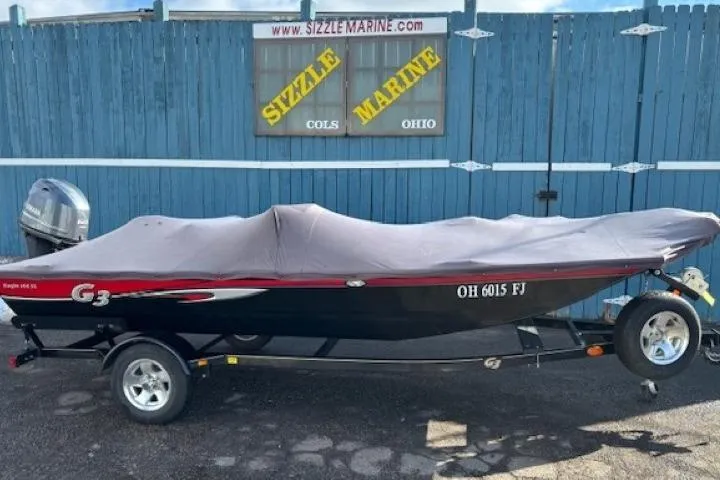 Slide: The Image of 2014 G3 Eagle 166 SE boat with cover, parked at Sizzle Marine, Ohio. - 30