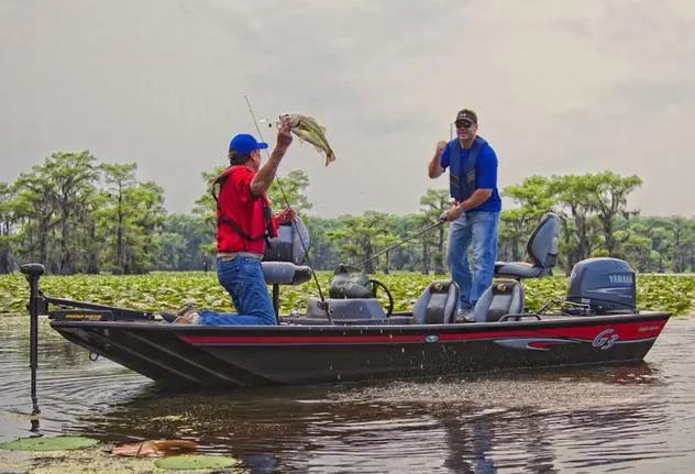 Slide: The Image of Manufacturer Provided Image: Two men fishing on a 2014 G3 Eagle 166 SE boat. - 31