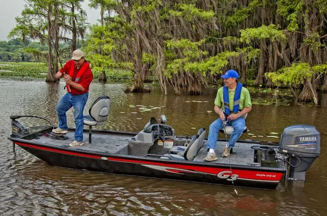 Slide: The Image of Manufacturer Provided Image: Two men fishing on a 2014 G3 Eagle 166 SE boat in a lake. - 32