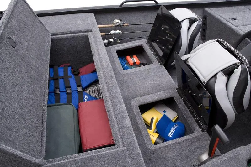 Slide: The Image of Manufacturer Provided Image: 2014 G3 Eagle 166 SE boat interior storage compartments with fishing gear and life jackets. - 33