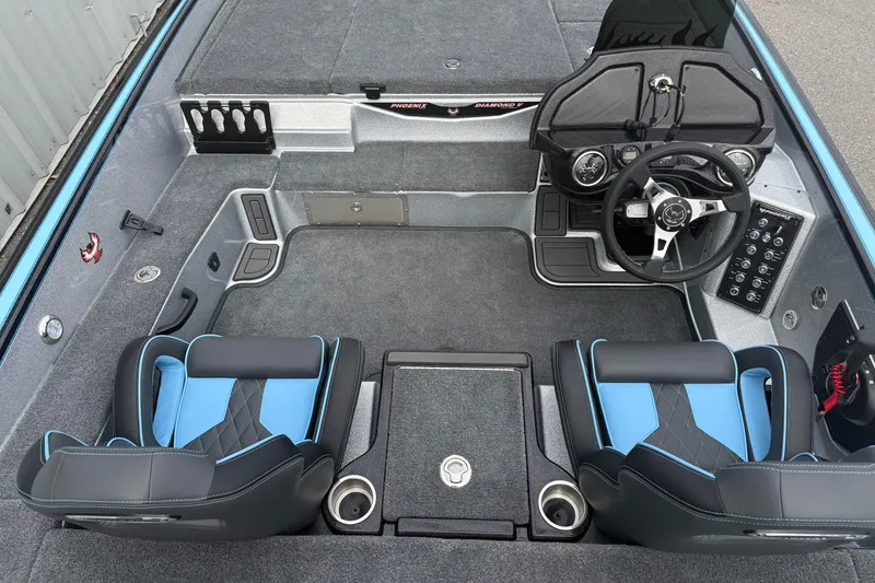 Slide: The Image of 2026 Phoenix 20 XE boat interior with dual seats, steering console, and carpeted flooring. - 11