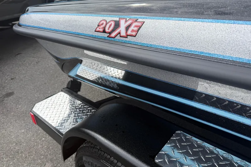 Slide: The Image of 2026 Phoenix 20 XE boat trailer with diamond plate step detail. - 3