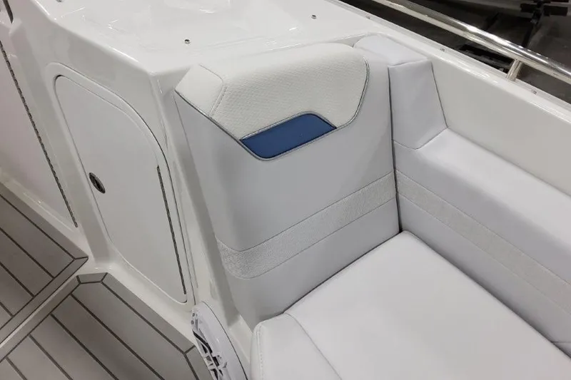 Slide: The Image of 2026 Formula 360 Crossover Bowrider I/O interior seating with white upholstery and blue accent. - 10