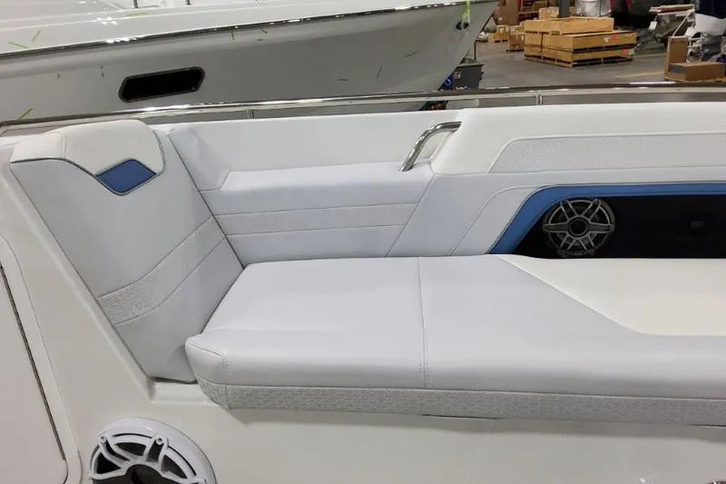 Slide: The Image of 2026 Formula 360 Crossover Bowrider I/O interior with white seating and speaker detail. - 15
