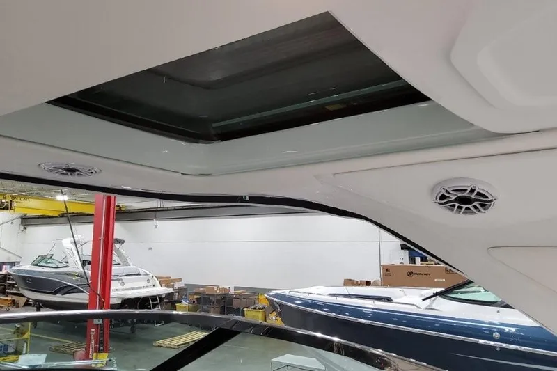 Slide: The Image of Interior view of 2026 Formula 360 Crossover Bowrider I/O with sunroof and speaker. - 2