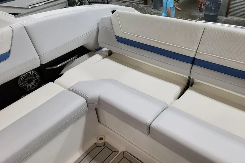 Slide: The Image of 2026 Formula 360 Crossover Bowrider I/O interior seating with white and blue upholstery. - 23