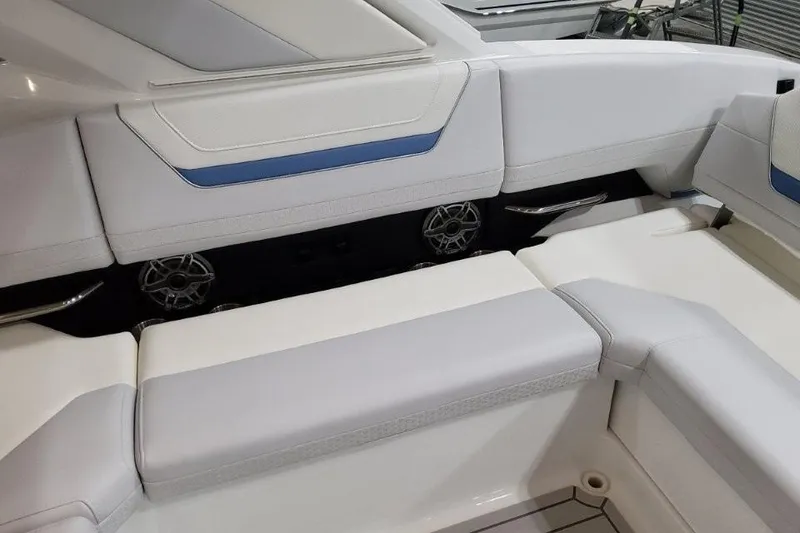 Slide: The Image of 2026 Formula 360 Crossover Bowrider I/O interior with white and blue seating. - 24