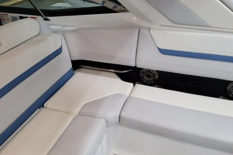 Slide: The Image of 2026 Formula 360 Crossover Bowrider I/O interior with white and blue seating. - 26