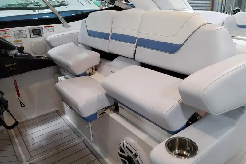 Slide: The Image of 2026 Formula 360 Crossover Bowrider I/O interior with white and blue seating. - 29