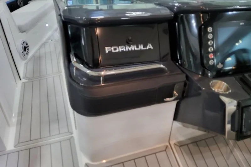 Slide: The Image of 2026 Formula 360 Crossover Bowrider I/O dashboard with sleek design and modern controls. - 35