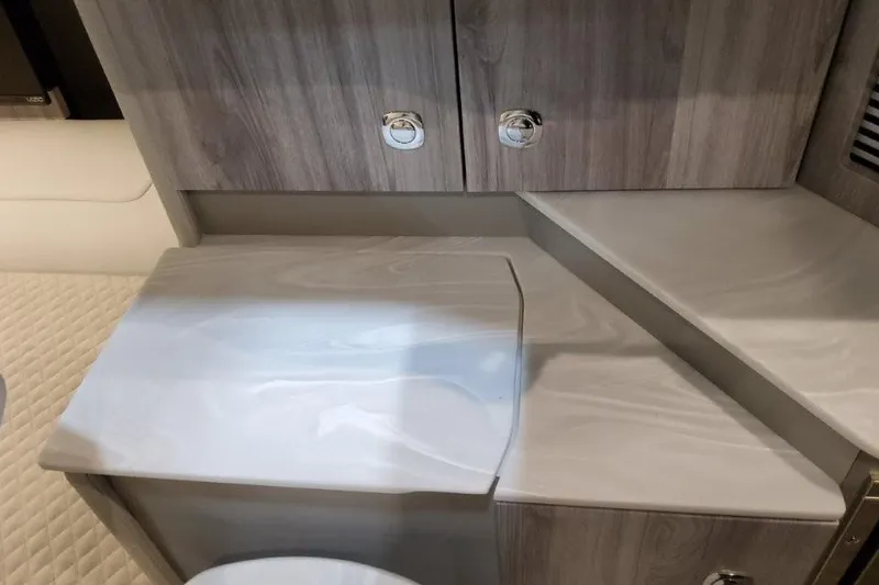 Slide: The Image of Interior of 2026 Formula 360 Crossover Bowrider I/O, featuring sleek cabinetry and countertop. - 37