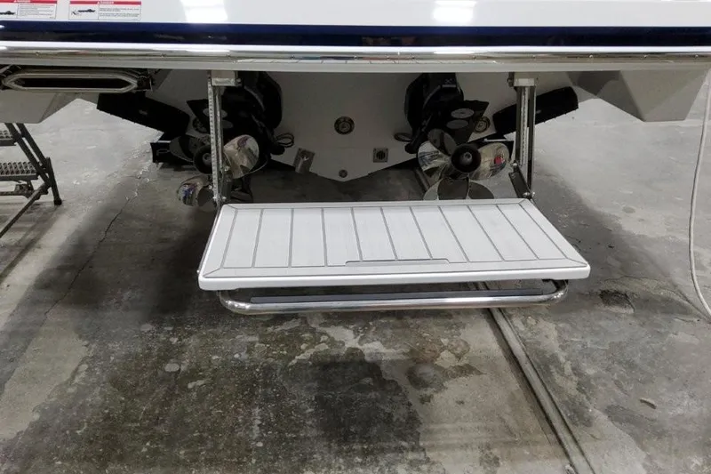 Slide: The Image of 2026 Formula 360 Crossover Bowrider I/O with swim platform and dual propellers. - 5