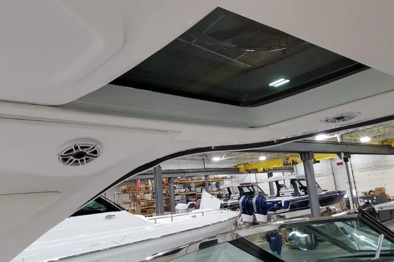 Slide: The Image of 2026 Formula 360 Crossover Bowrider I/O interior with sunroof and speaker detail. - 8