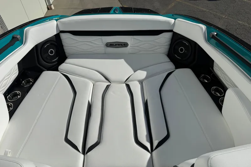 Slide: The Image of Luxurious interior of 2026 Supra SA 575 boat with white seating and speakers. - 5