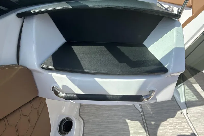 Slide: The Image of 2024 Four Winns H1 OB boat interior with sleek seating and modern design. - 18