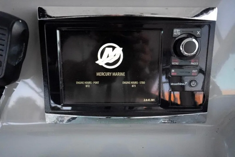 Slide: The Image of Mercury Marine display on 2014 Boston Whaler 315 Conquest, showing engine hours. - 39