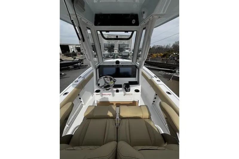 Slide: The Image of 2026 Sportsman Heritage 231 Center Console interior with modern helm and seating. - 15