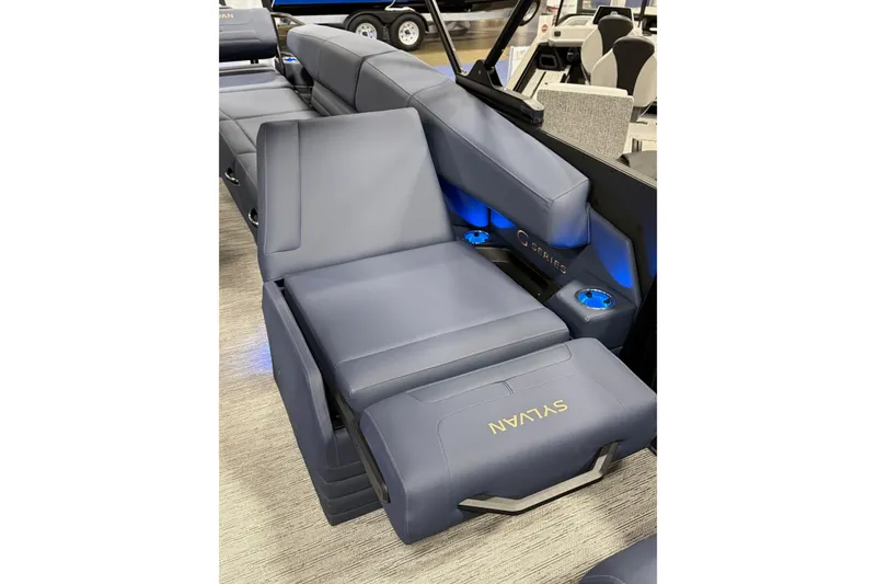 Slide: The Image of Luxurious seating on 2025 Sylvan G3 SLZ boat with blue LED lighting. - 10