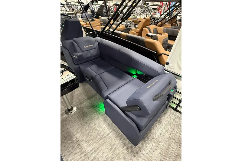 Slide: The Image of 2025 Sylvan G3 SLZ boat interior with luxurious seating and ambient lighting. - 16
