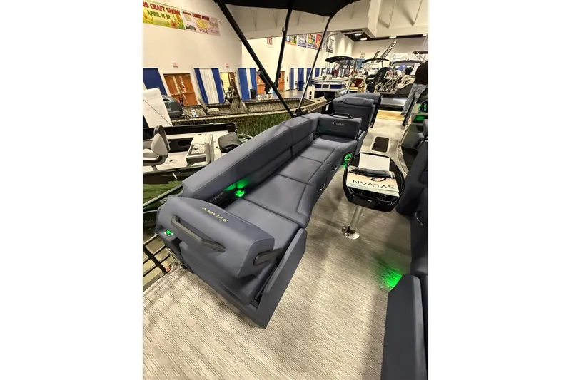Slide: The Image of 2025 Sylvan G3 SLZ boat interior with sleek seating and ambient lighting. - 17