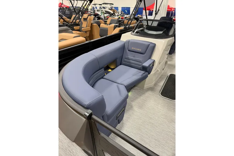 Slide: The Image of 2025 Sylvan G3 SLZ boat interior with luxurious blue seating. - 5